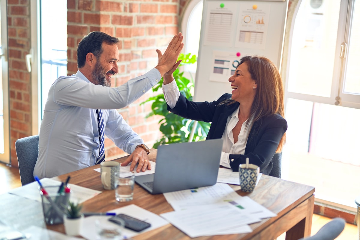 Business professionals discussing strategy in a modern office