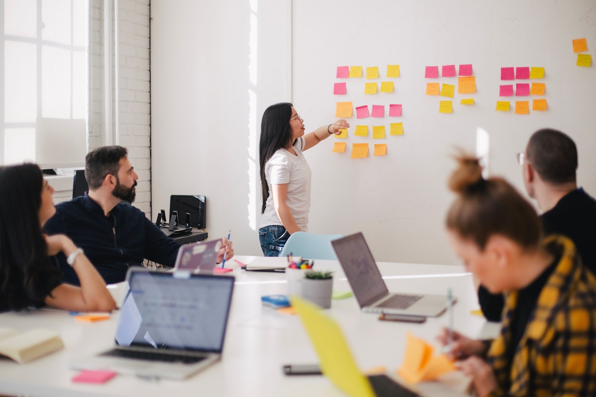 Team collaboration at a modern office representing corporate governance and responsibility